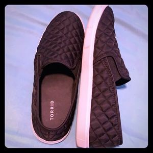 Black quilted Slip ons